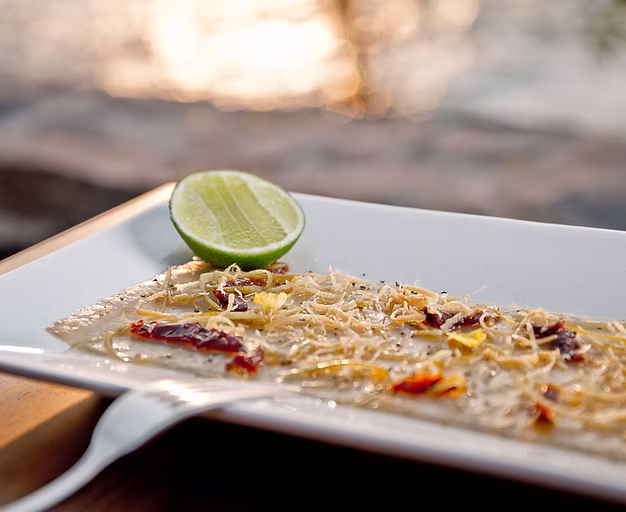 Carpaccio de Medregal con Olivo